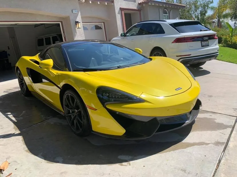 Volcano Yellow McLaren 570S exotic sports car detailed with ceramic paint protection