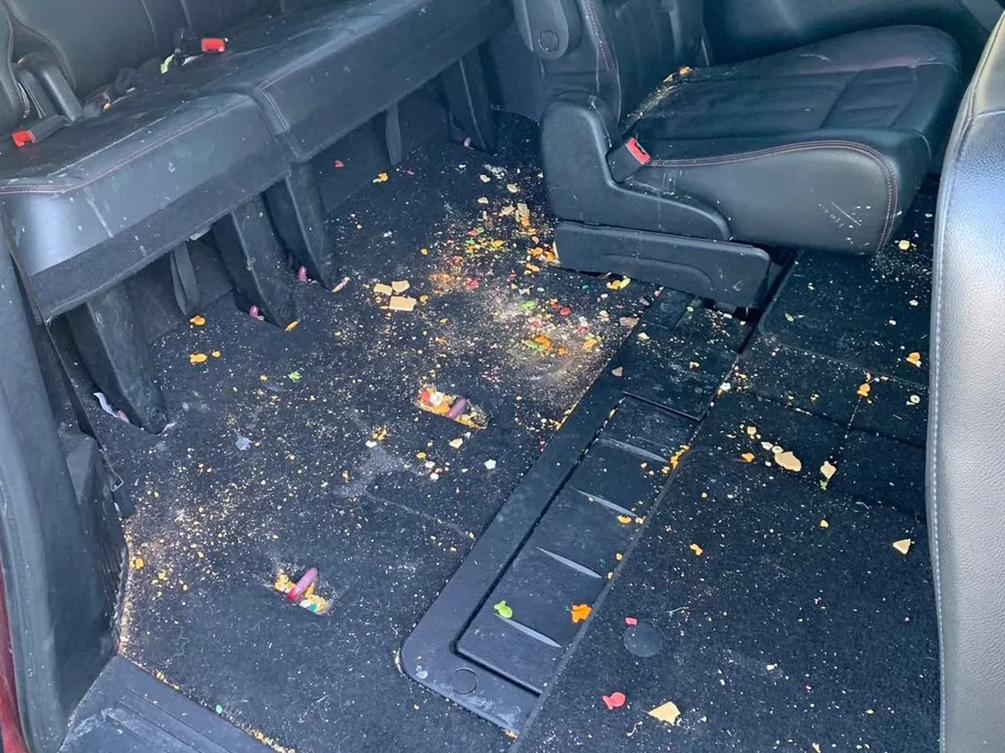Before: Minivan carpet before and after professional extraction and shampoo