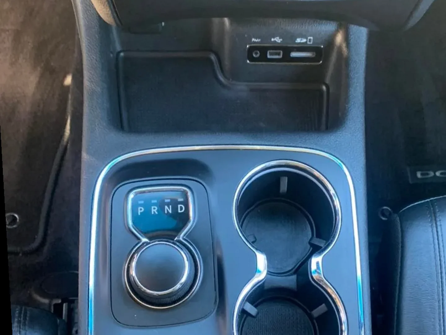 After: Center console cupholders before and after degreasing and steam cleaning