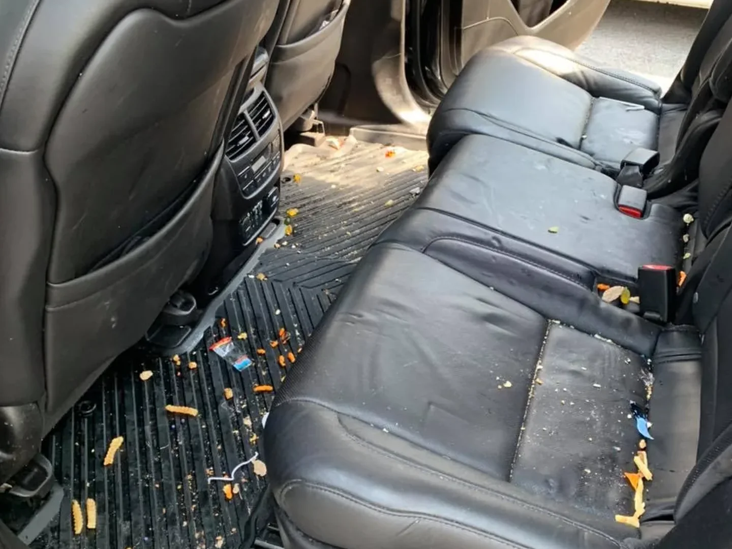 Before: SUV rear row before and after interior detailing and leather conditioning