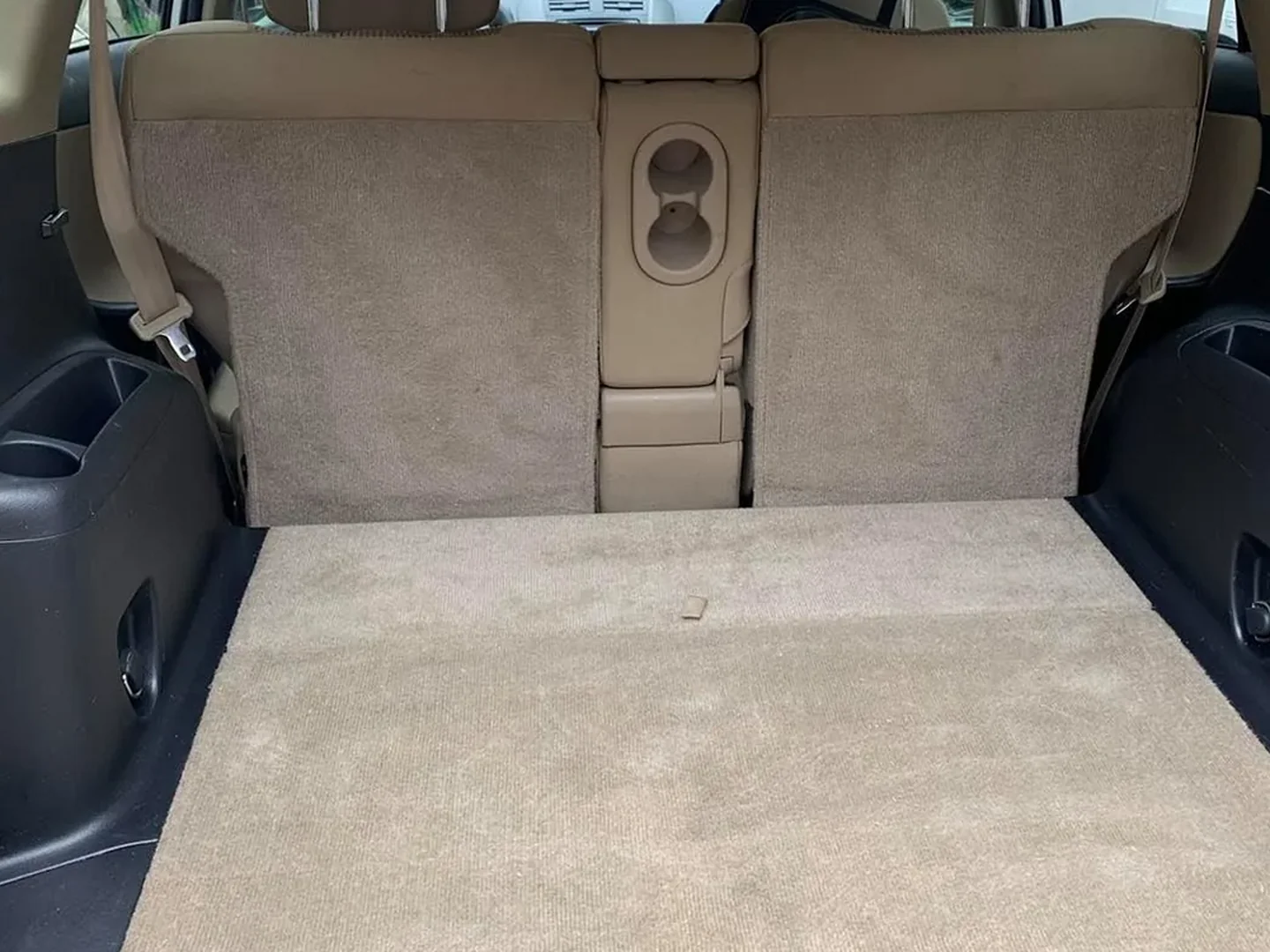 After: SUV cargo trunk before and after deep vacuuming and brush cleaning