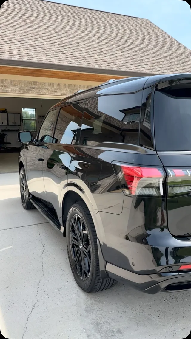 Black Infiniti QX80 showing its ceramic-coated finish in Ooltewah