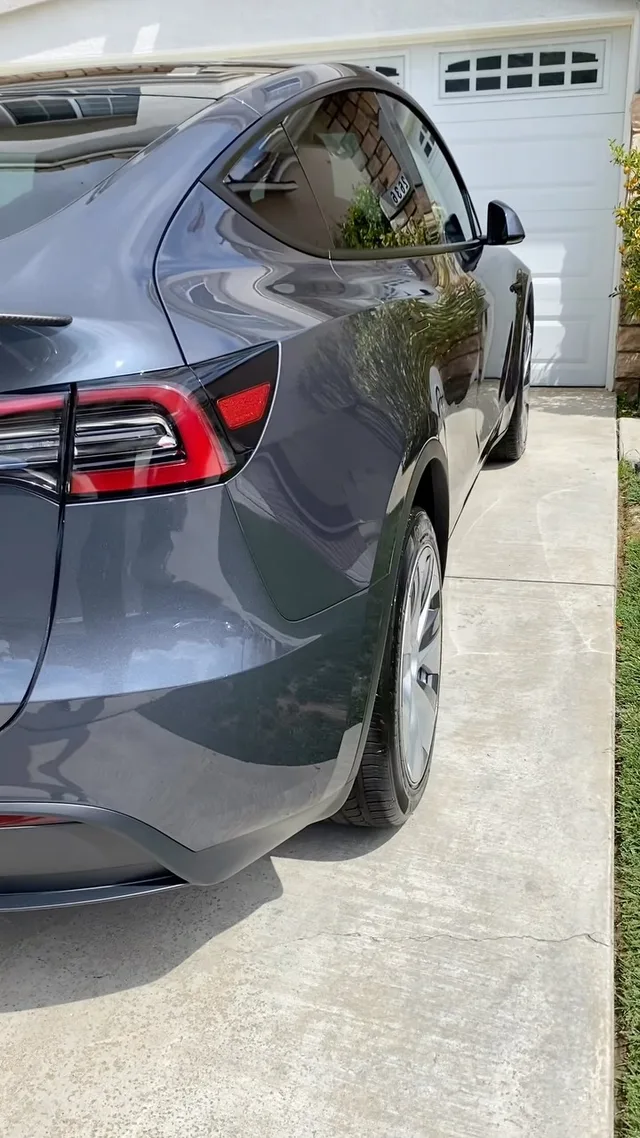 Gray Tesla with reflective ceramic-coated paint, shared by Pacific Coast Detailing