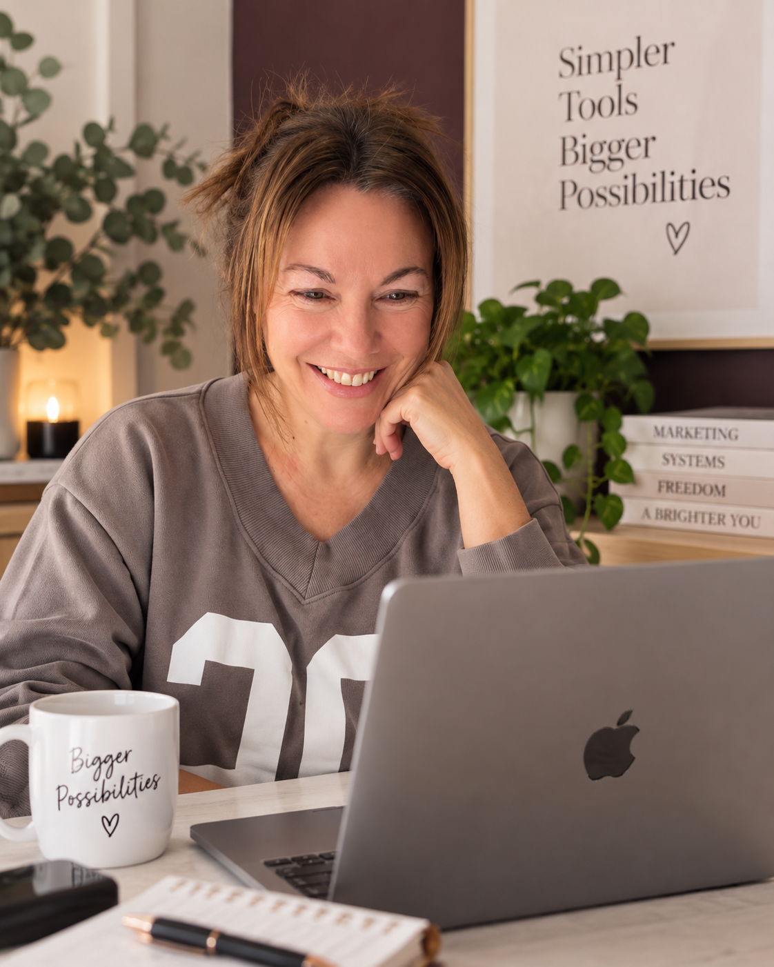 Deb Malone working on her MacBook