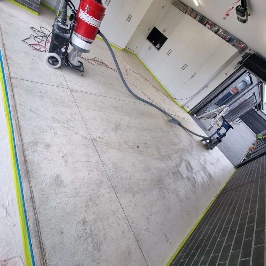 Finished high-gloss seamless epoxy garage floor in Maribyrnong with a clean, reflective surface