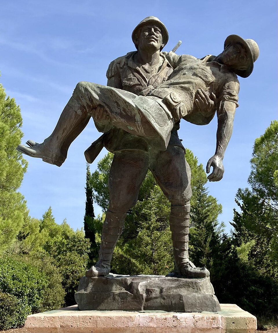Respect to Mehmetçik Memorial statue at Gallipoli, Turkey, showing a Turkish soldier carrying a wounded enemy during the 1915 Gallipoli Campaign.