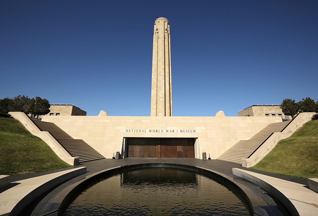 Entrance to the National WWI Museum and Memorial in Kansas City, Missouri, featuring the Liberty Memorial tower above the main entrance and reflecting pool.