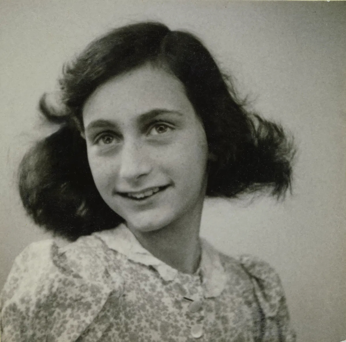 Last known photograph of Anne Frank taken in May 1942 during a passport photo session in Amsterdam, black-and-white portrait. Last known photograph of Anne Frank taken in May 1942 during a passport photo session in Amsterdam, black-and-white portrait.