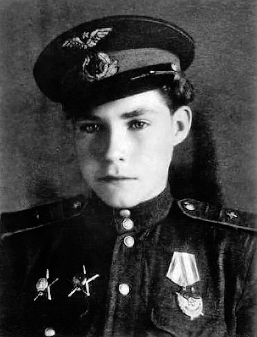 Portrait of Arkady Kamanin, one of the youngest military pilots of World War II, wearing his Soviet Air Force uniform and medals earned while serving on the Eastern Front. Portrait of Arkady Kamanin, one of the youngest military pilots of World War II, wearing his Soviet Air Force uniform and medals earned while serving on the Eastern Front.
