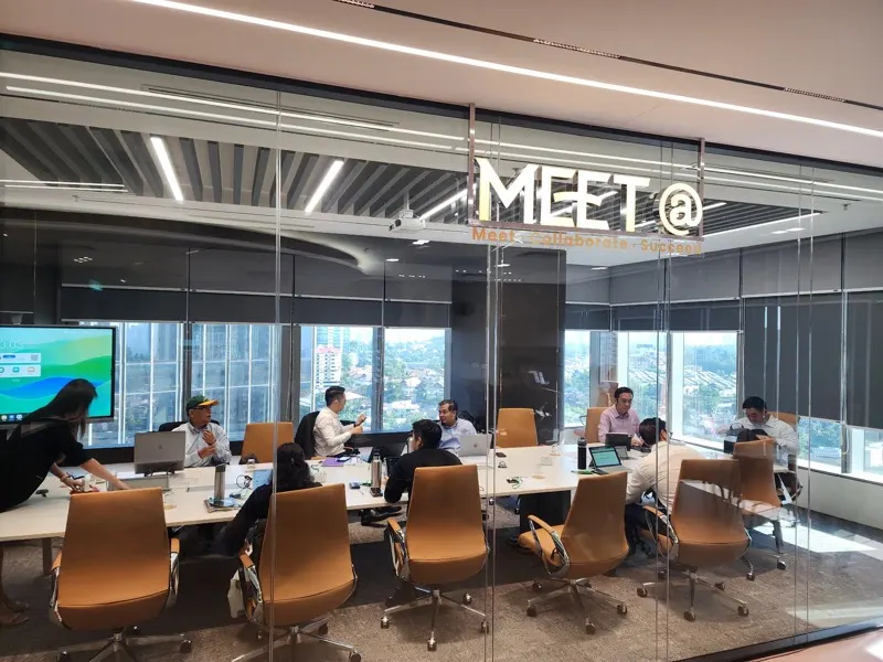 Nexus Executive Boardroom, a full table, seen through the glass wall
