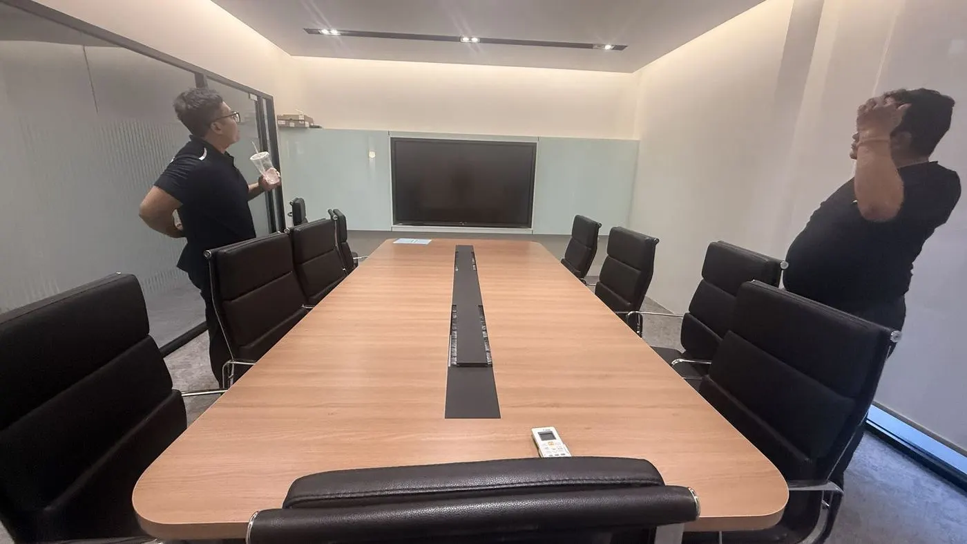 Hytech staff at a boardroom installation