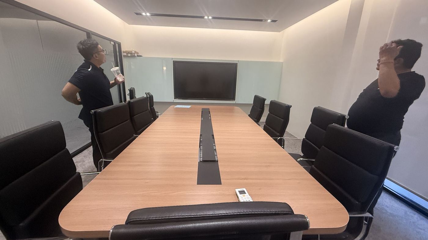 Hytech staff at a boardroom installation