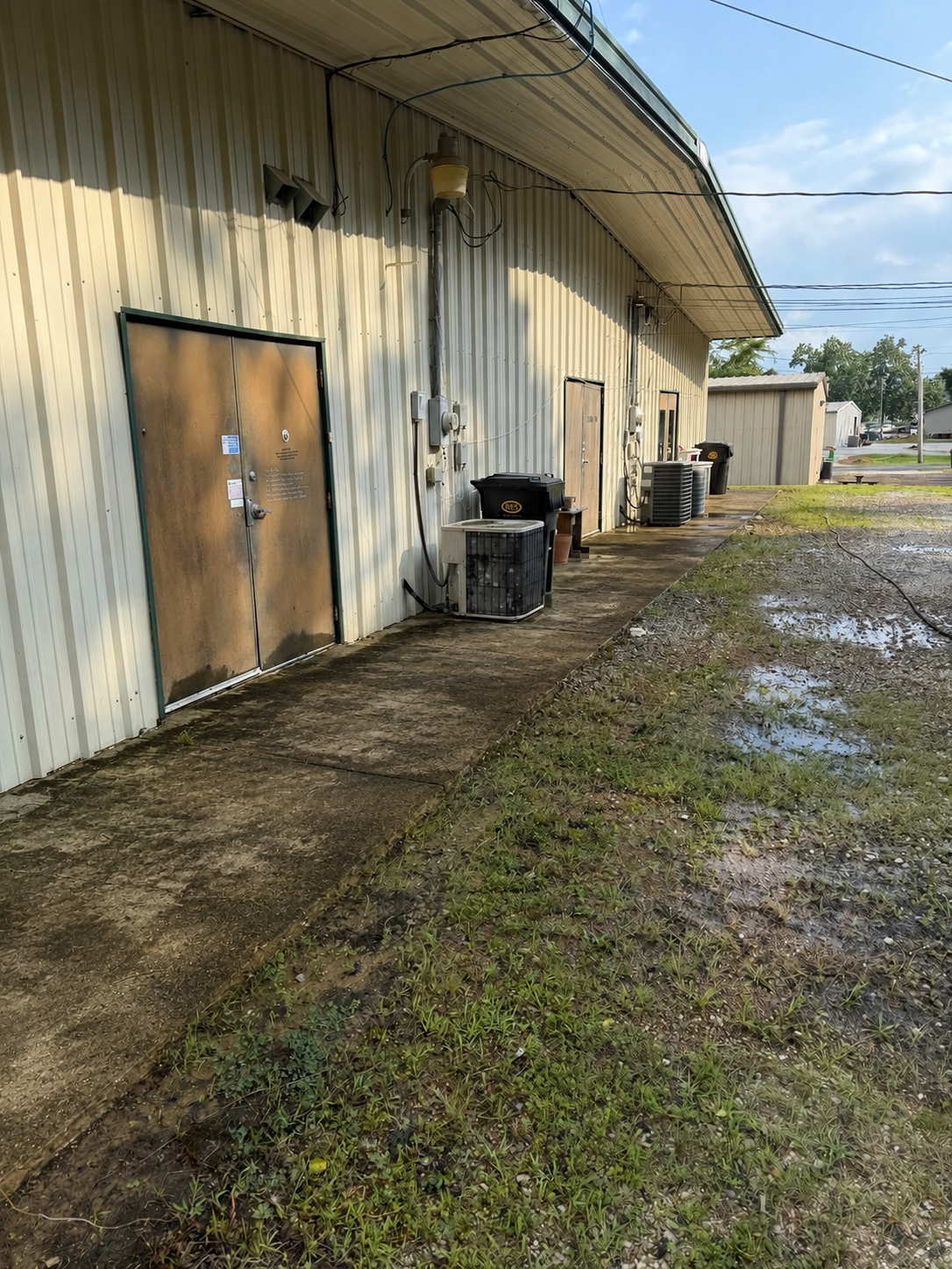 Commercial pressure washing on a business storefront in North Mississippi