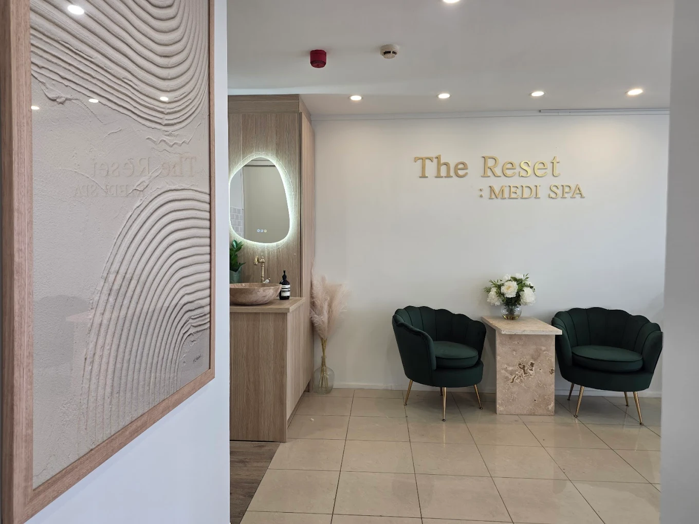 Reception and waiting area at The Reset Medi Spa, Eastwood