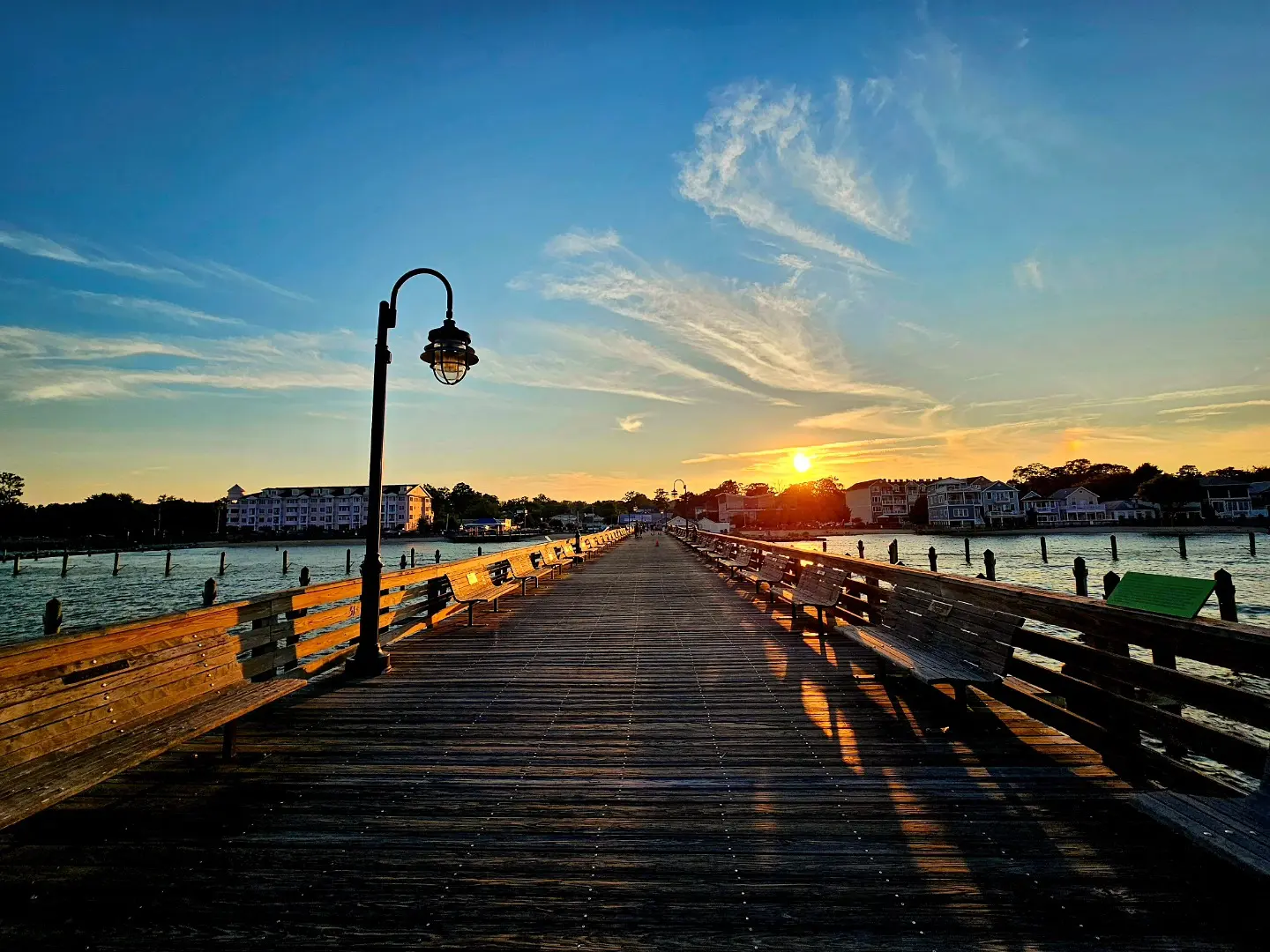 Sunset over a waterfront boardwalk in Southern Maryland