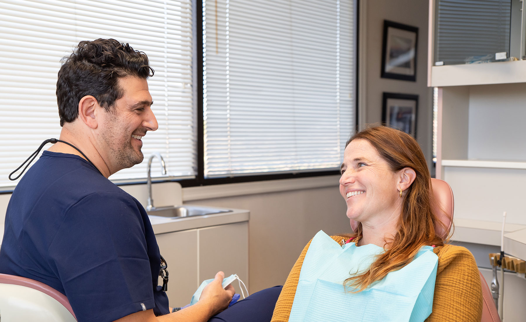 Woman holding invisalign