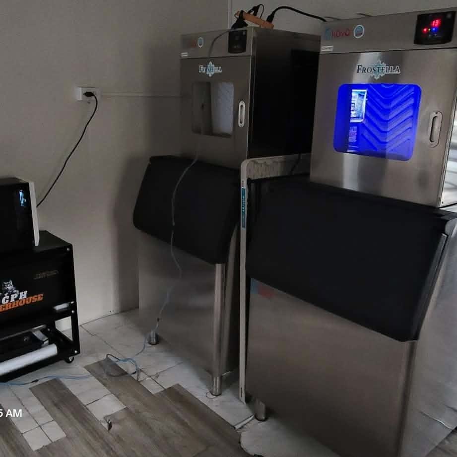An OCPH unit on a cart powering two commercial Frostella ice machines
