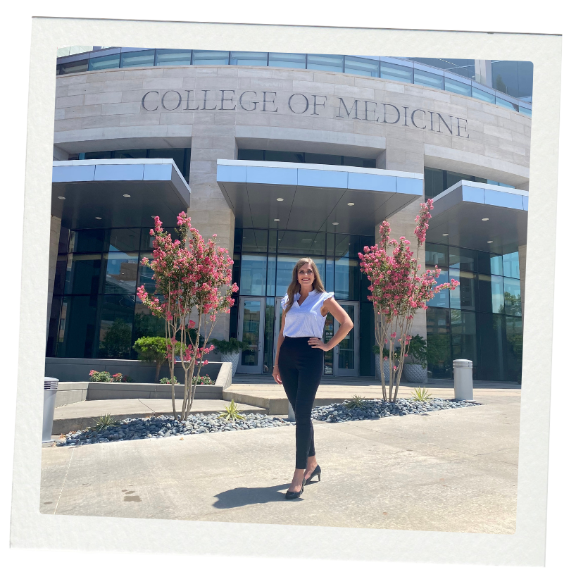 Autumn Raines Lockett, admissions coach, in front of College of Medicine