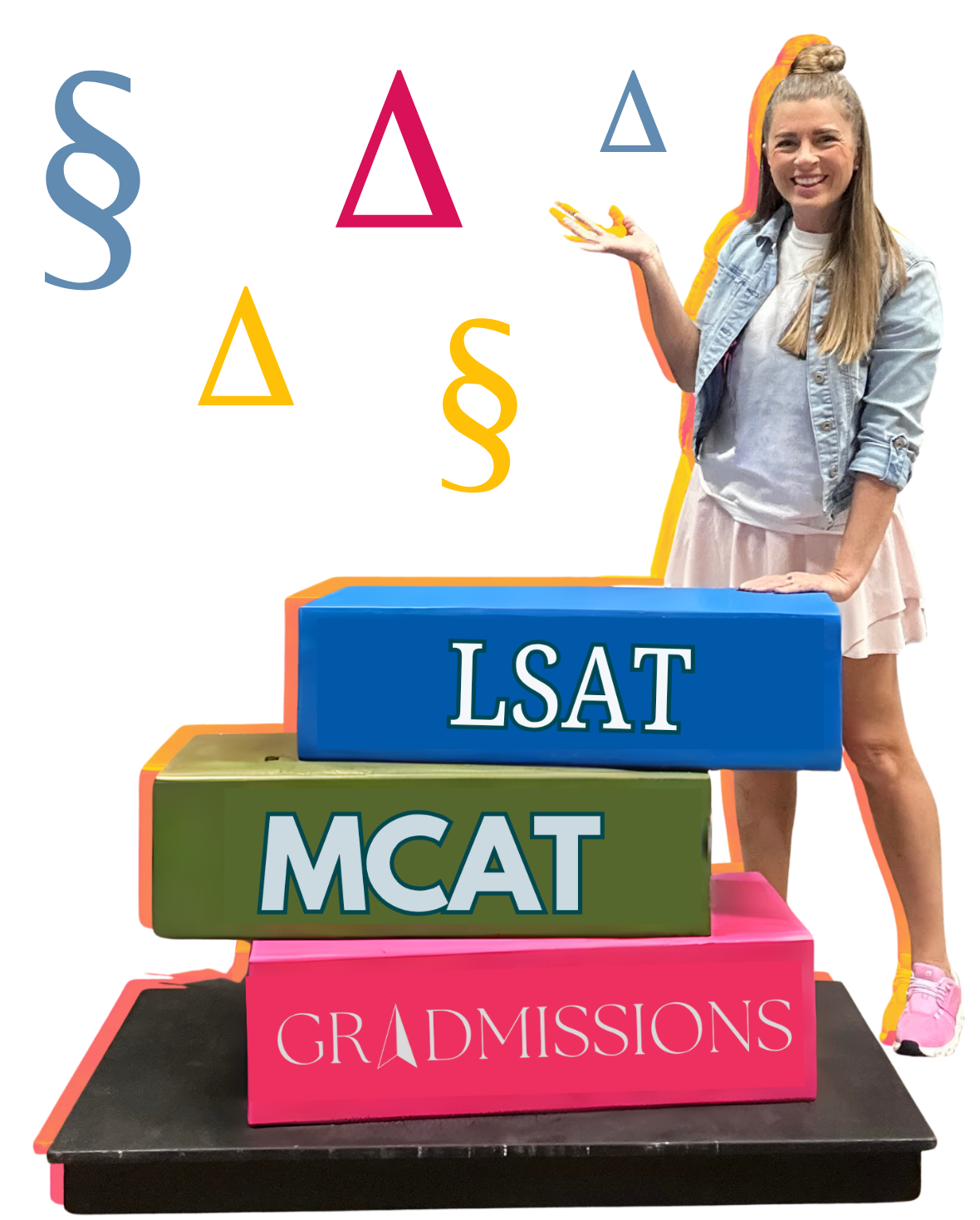 Autumn Raines Lockett, admissions coach, posing with LSAT, MCAT, and Gradmissions study books