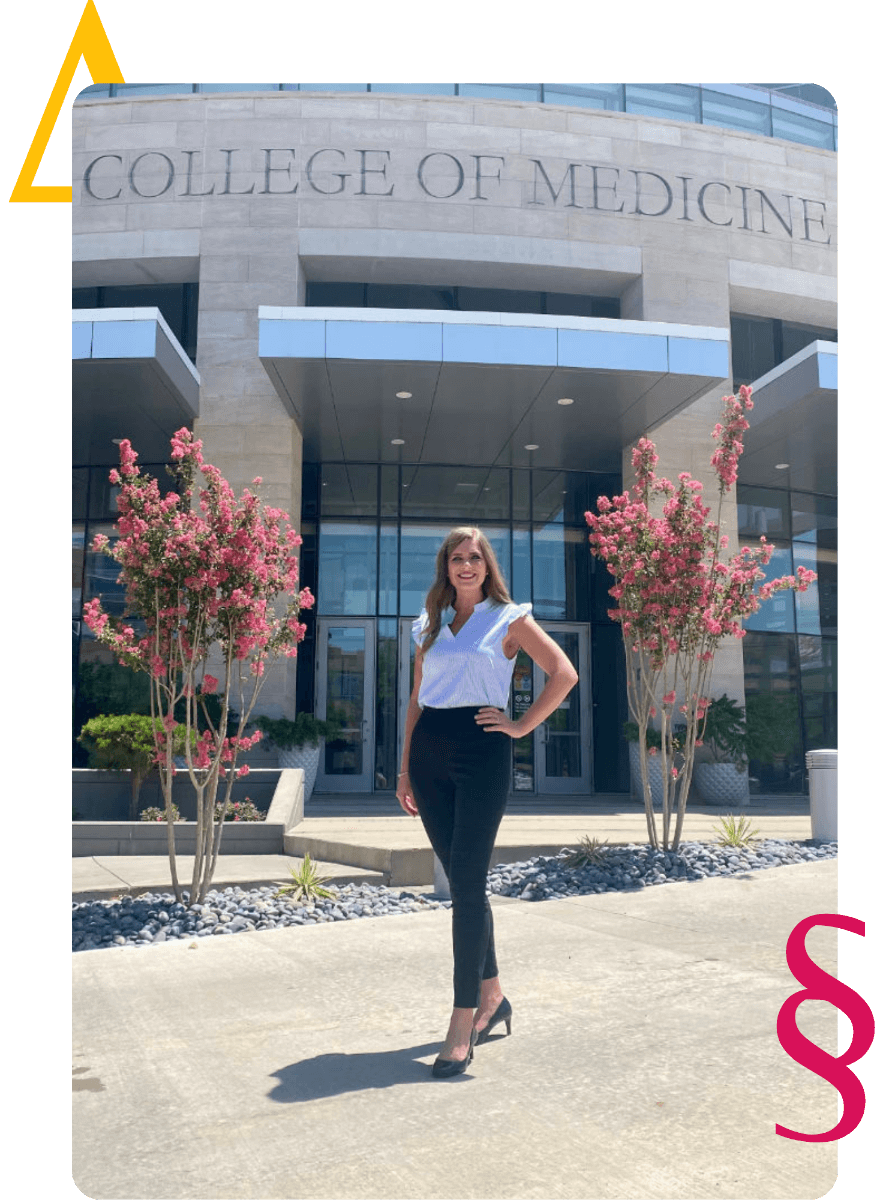 Autumn Raines Lockett, admissions coach, in front of College of Medicine