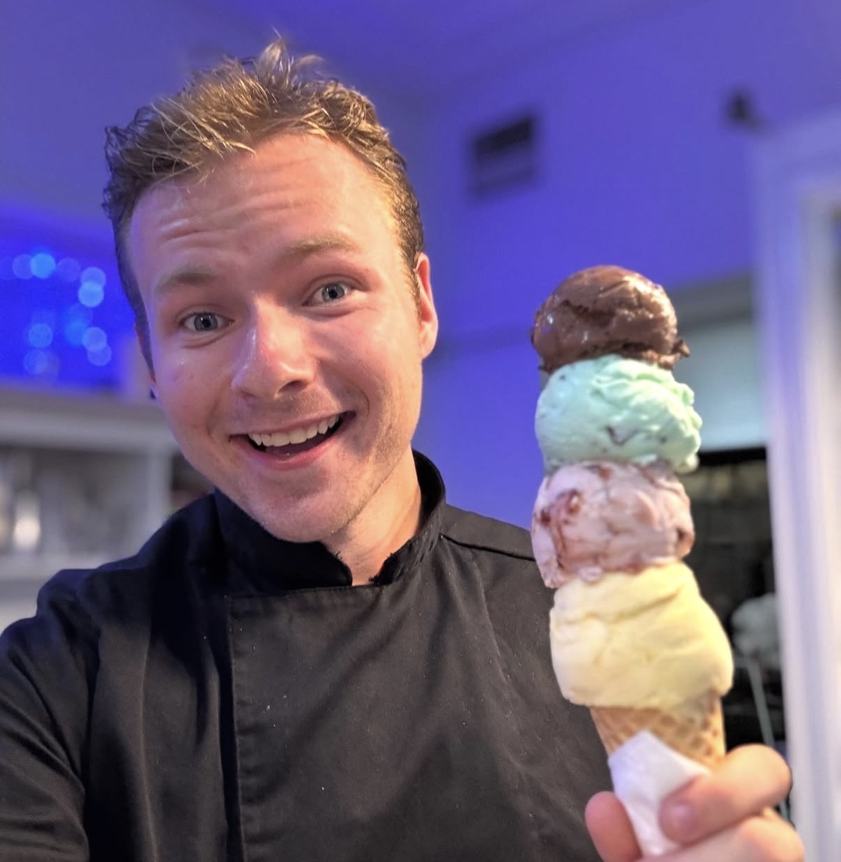 The Gelato Maker holding a cone