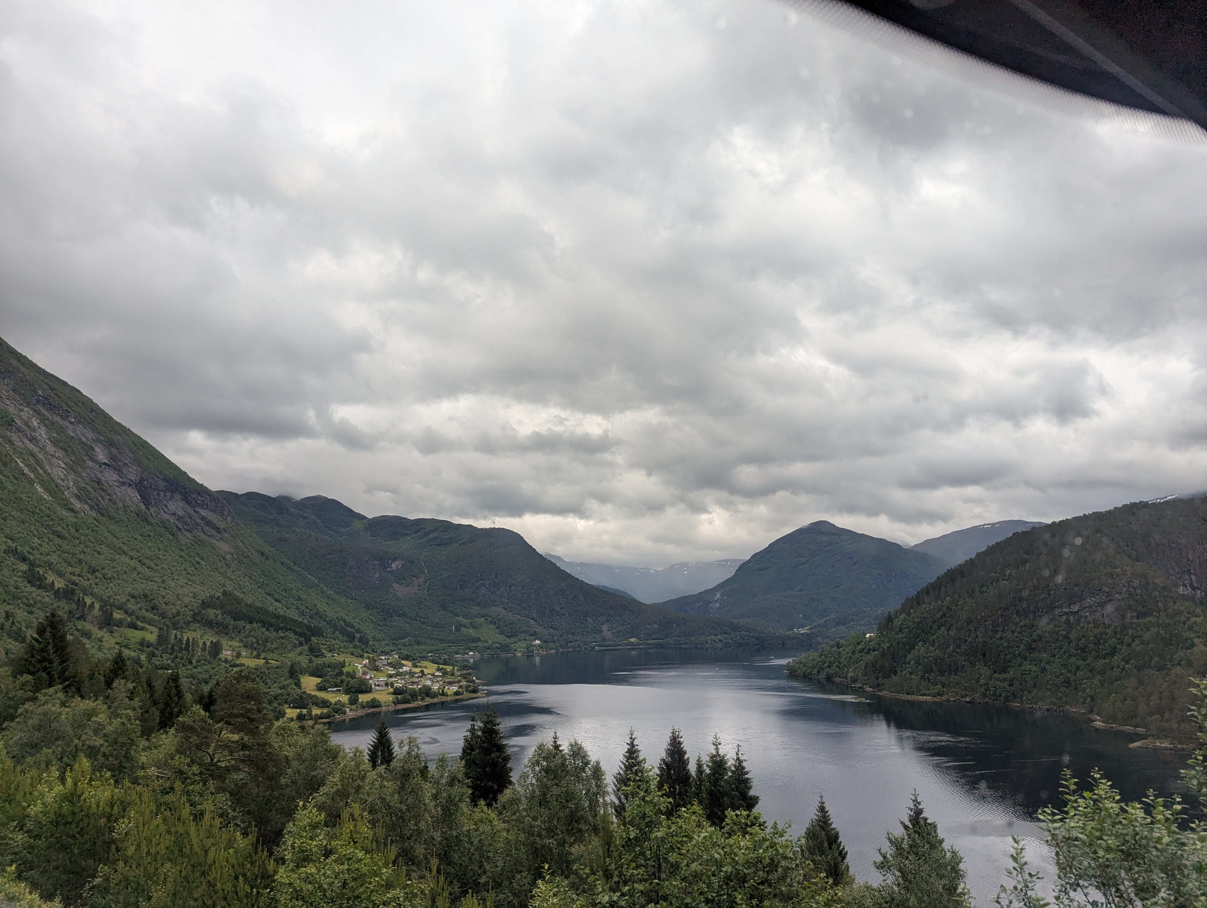 View of the fjords from the upper deck of a bus. View of the fjords from the upper deck of a bus.