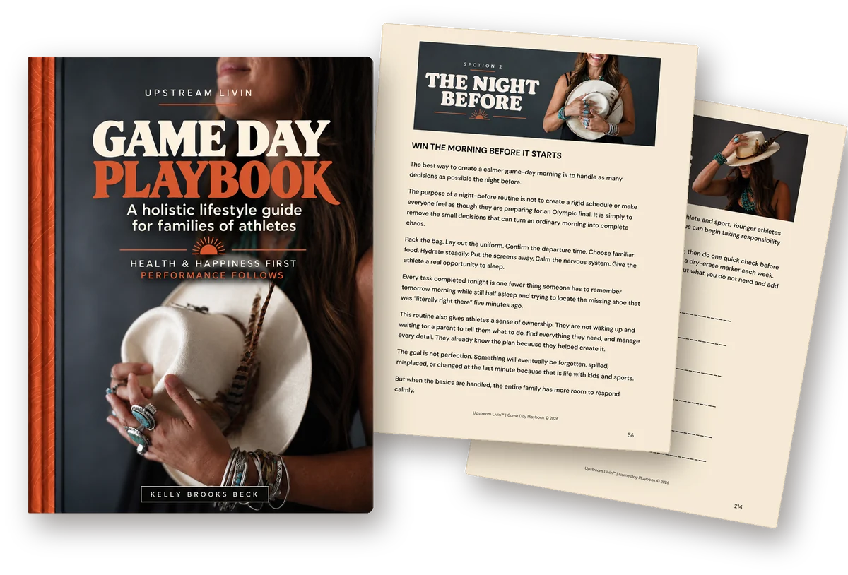 The Game Day Playbook cover with two inside pages fanned out behind it