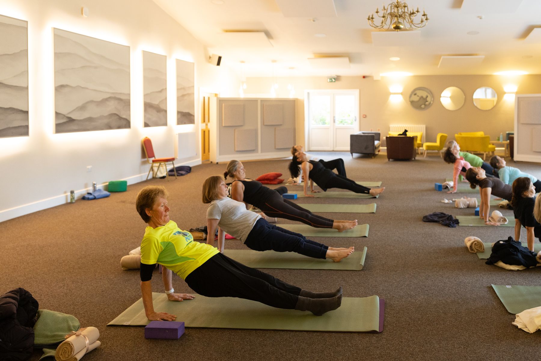 Group plank pose practice at Eaton Manor