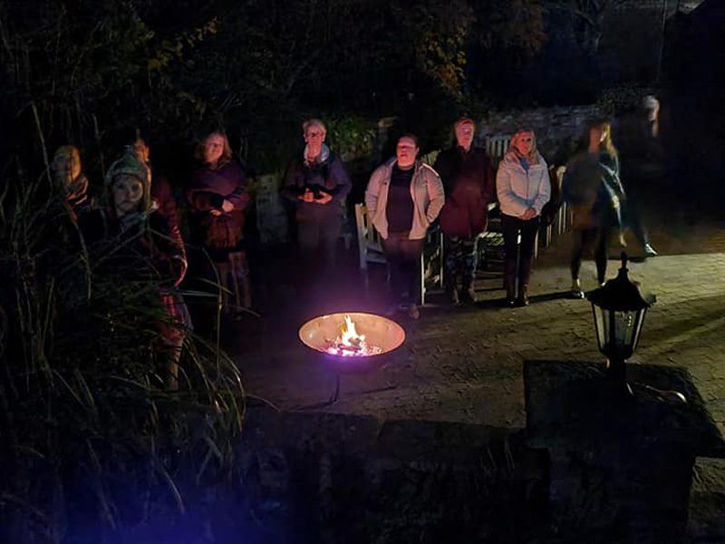 Evening fire pit gathering at Eaton Manor