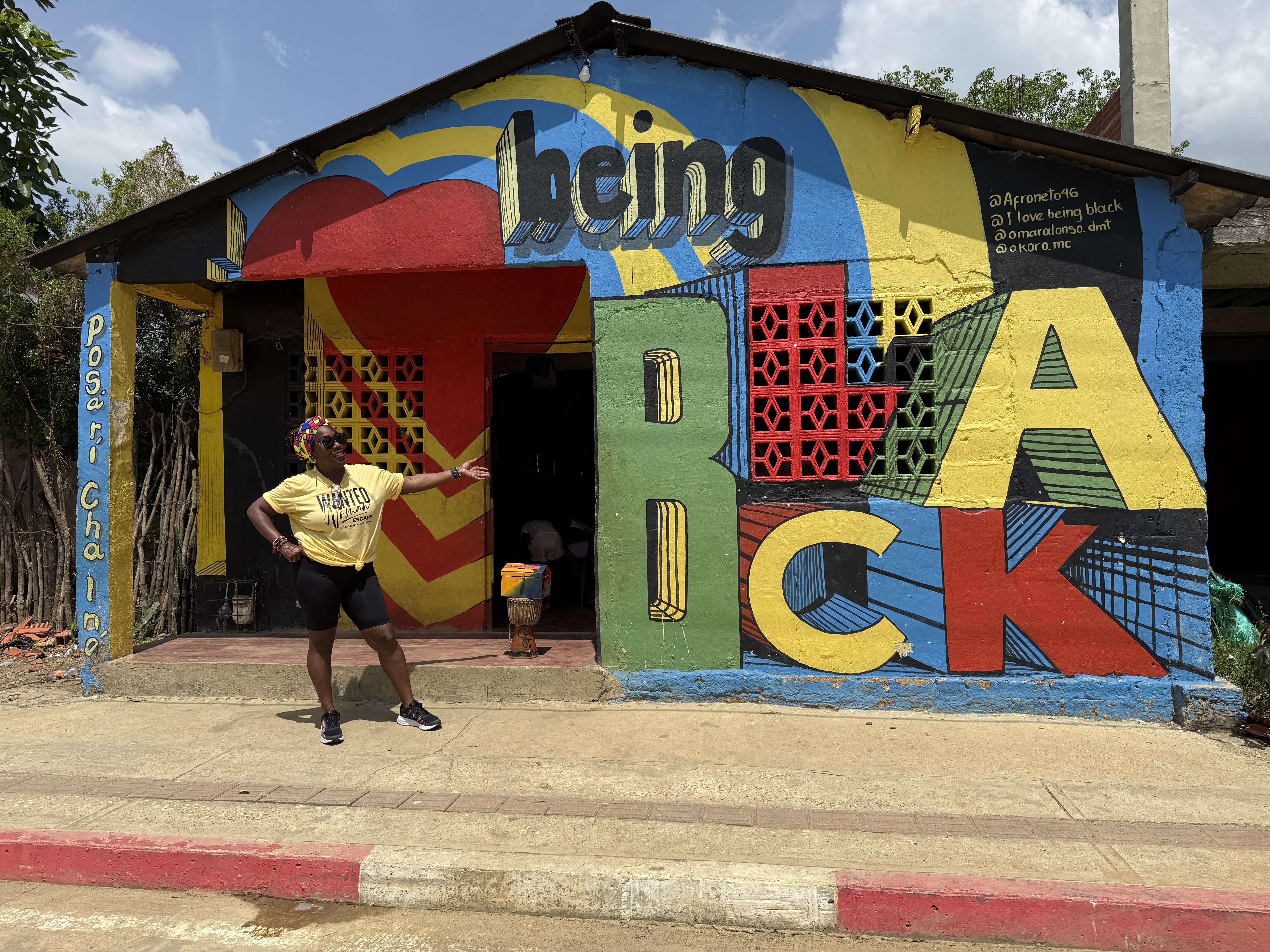 Women visiting Cartagena cultural mural during the WANTED Woman Escape