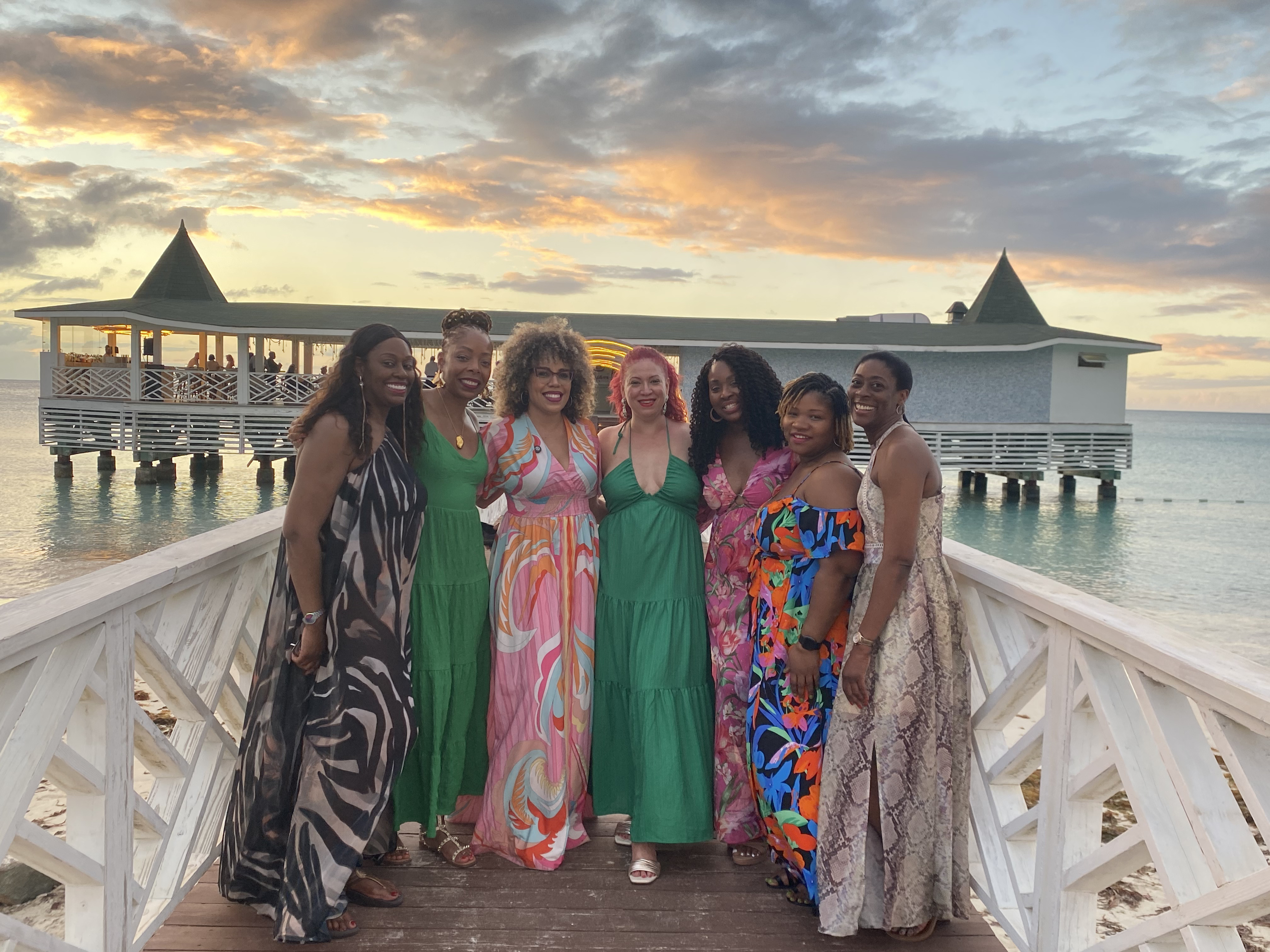 Women enjoying sunset during the WANTED Woman Escape in Antigua Caribbean
