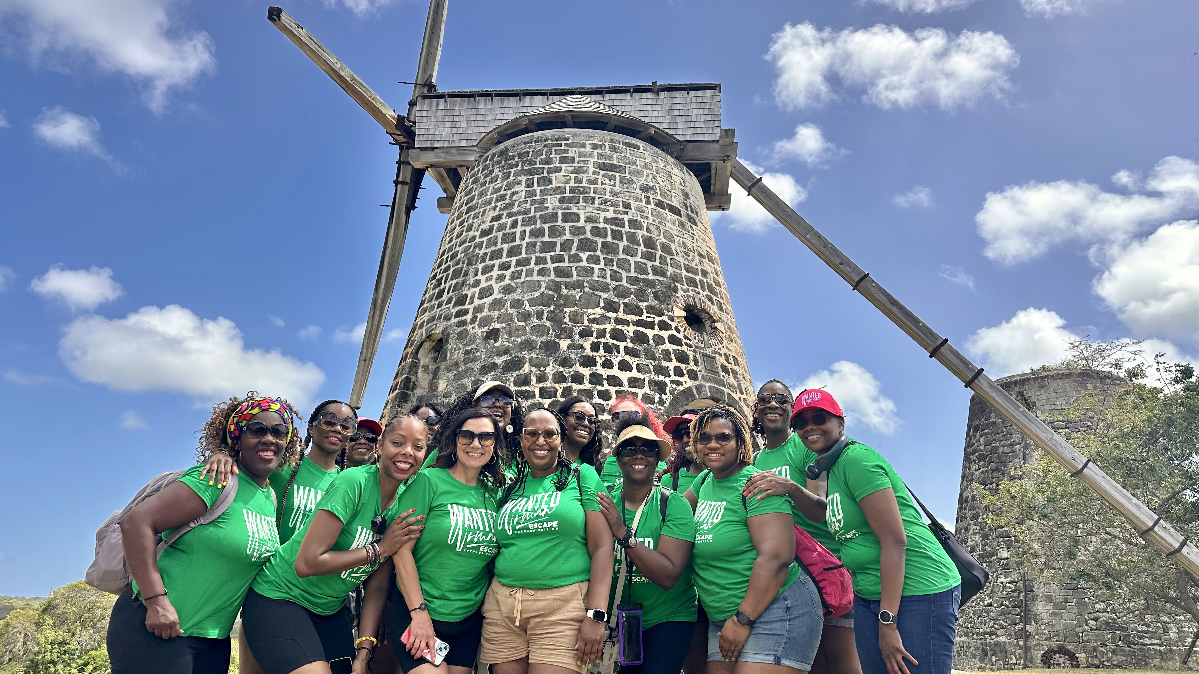 Women visiting Antigua historic windmill during the WANTED Woman Escape