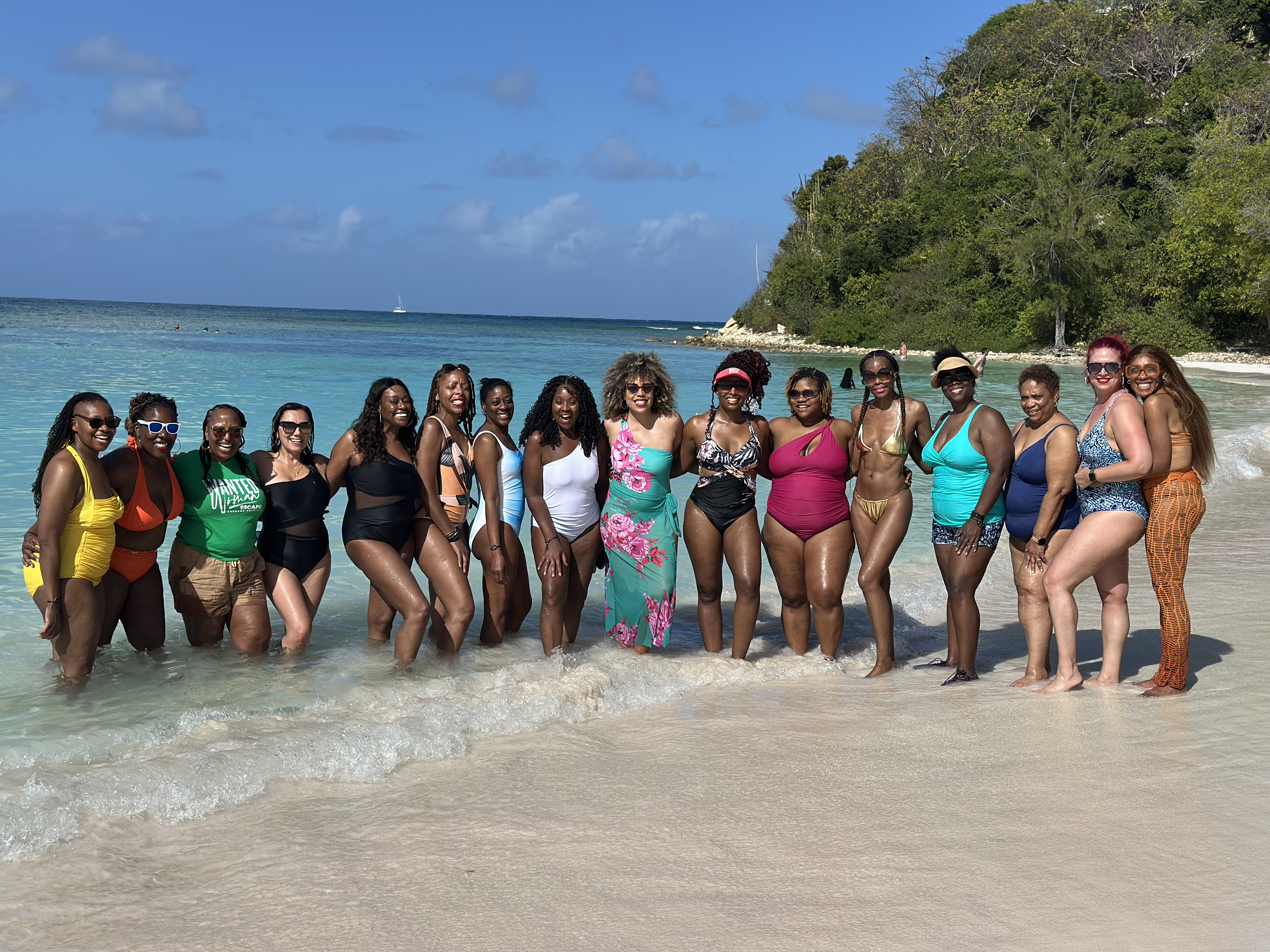 Women enjoying the Caribbean beach during the WANTED Woman Escape in Antigua