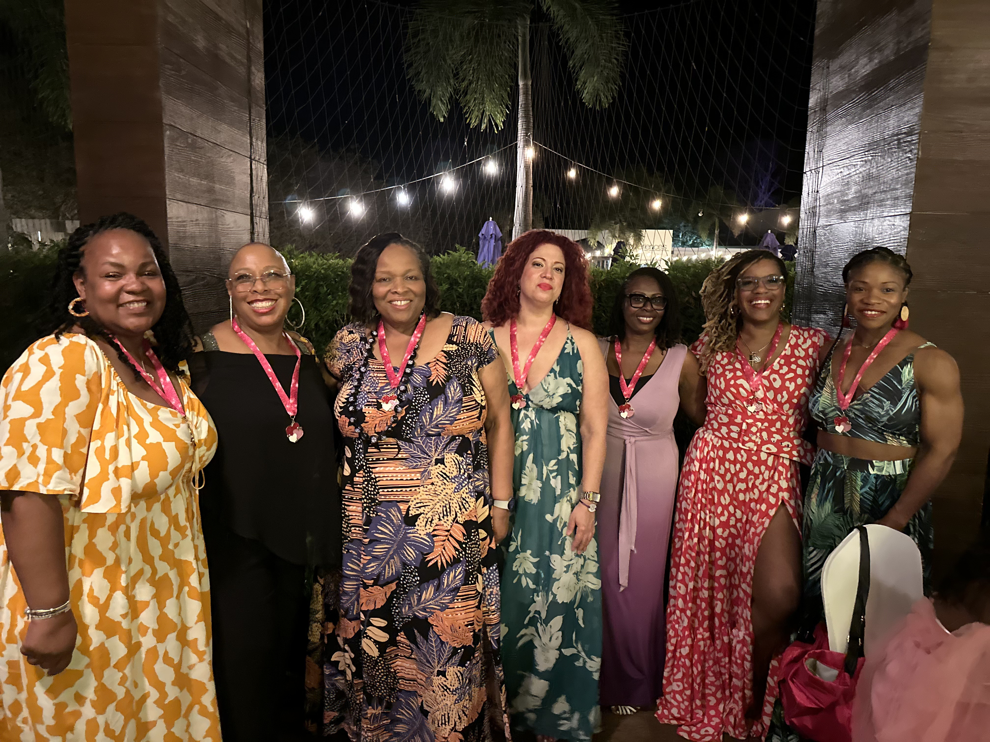Women enjoying poolside fun during the WANTED Woman Escape in Costa Rica