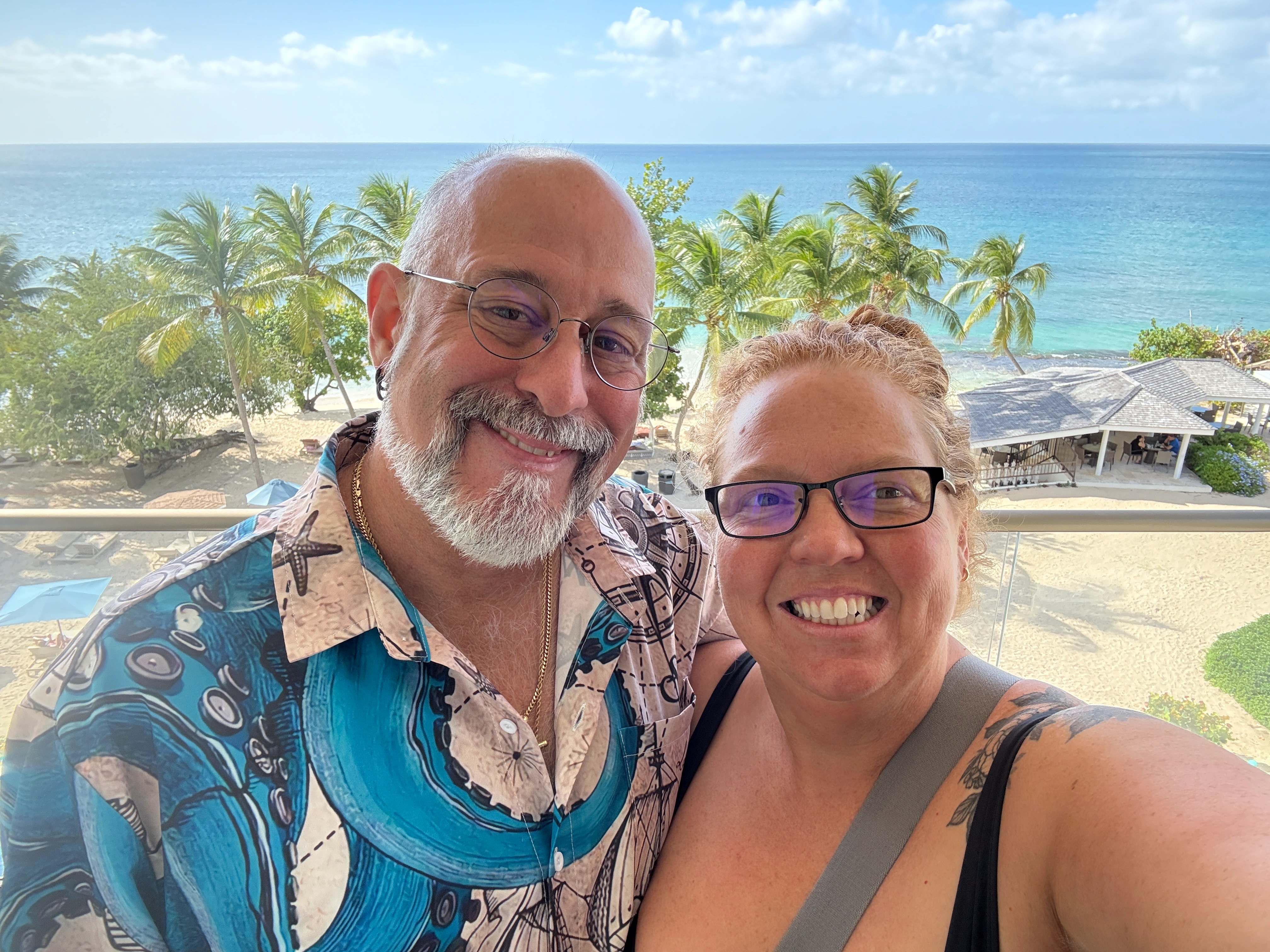 happy couple smiling at Zanzibar beach resort during luxury retreat experience