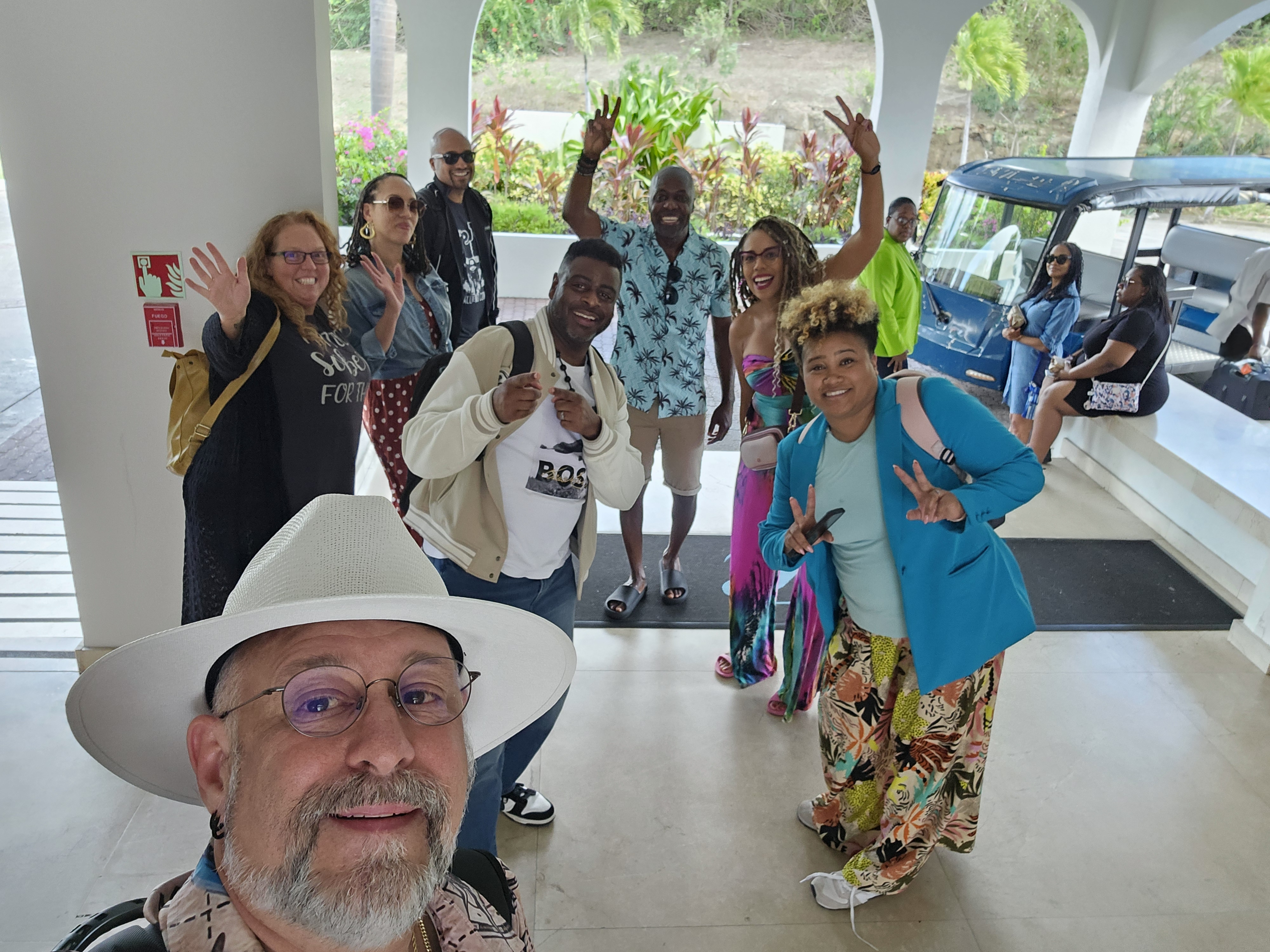 group of adults in matching shirts at relationship retreat experience
