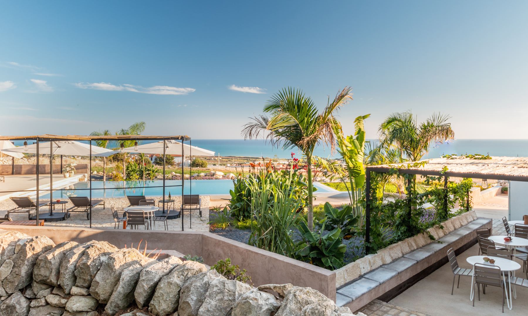 Garden terraces and the pool looking out to the Mediterranean
