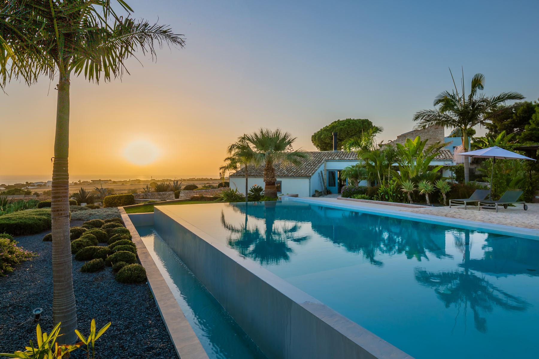 The infinity pool at sunset