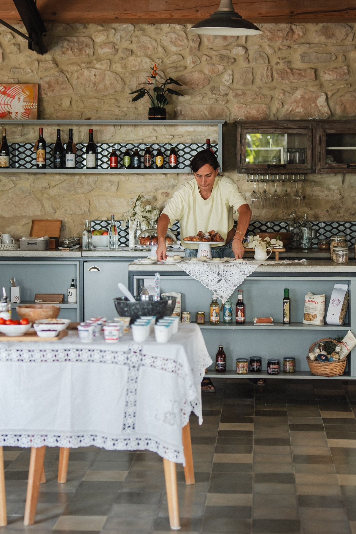 Pastries being laid out on the kitchen counter