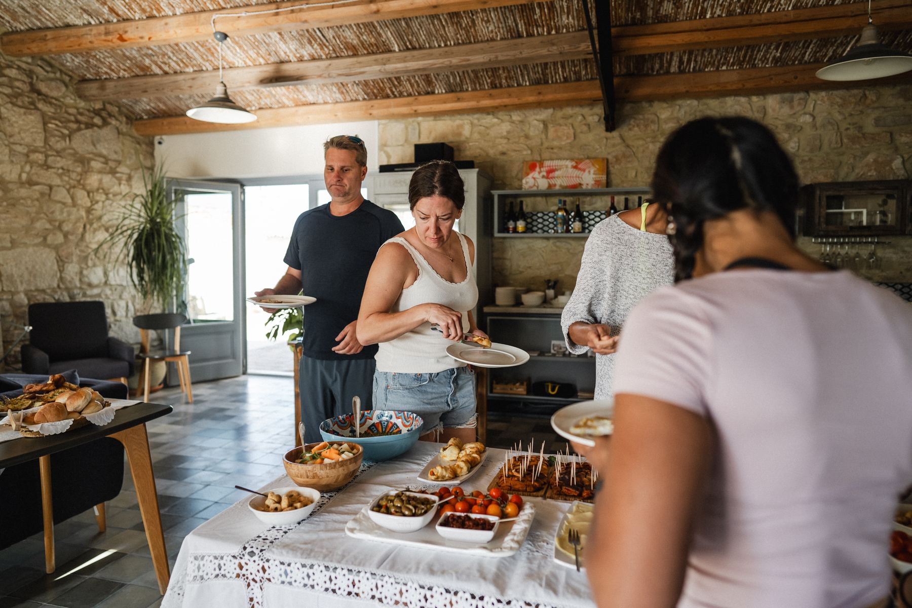 Guests helping themselves at the brunch table