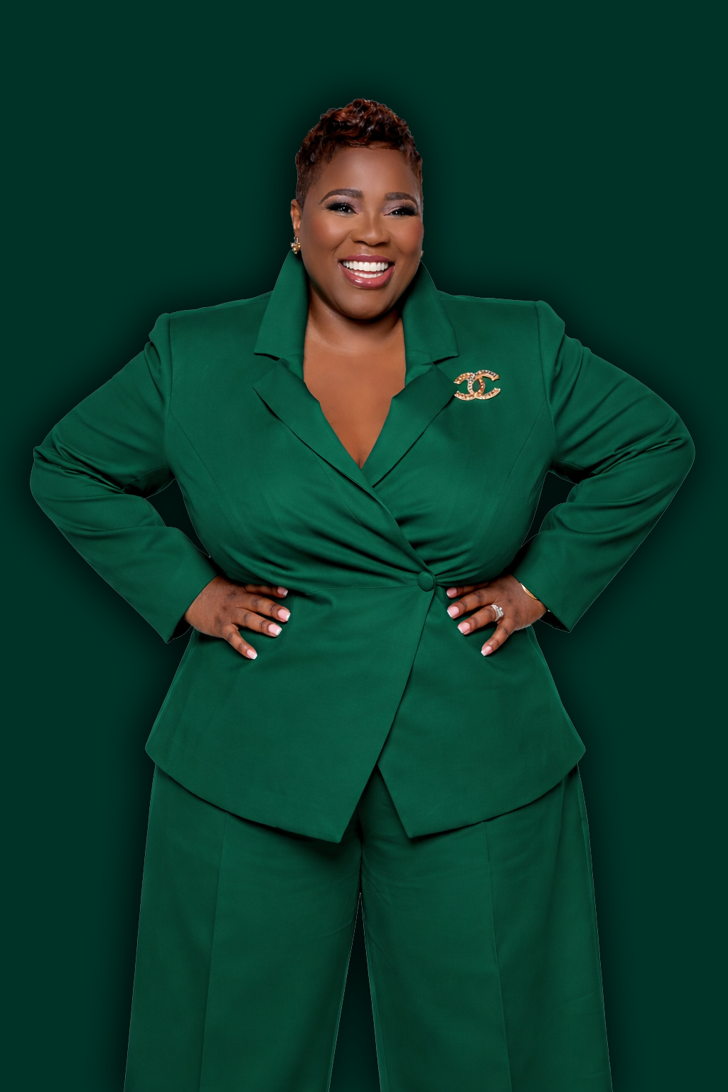 Mary H. Davis in green suit — hands on hips, direct and ready