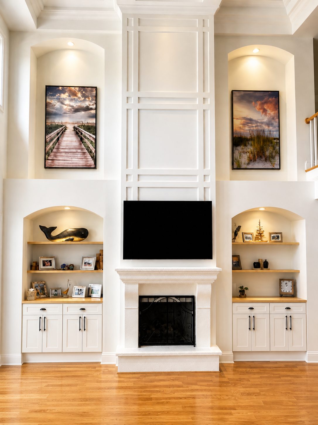 After &mdash; a custom built-in with a linear fireplace, cabinetry and lit floating shelves