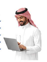 صاحب منشأة سعودي يستخدم حاسوبًا محمولًا لمتابعة أعماله
