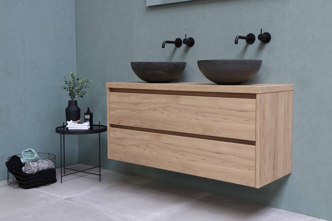 white wooden vanity sink with mirror