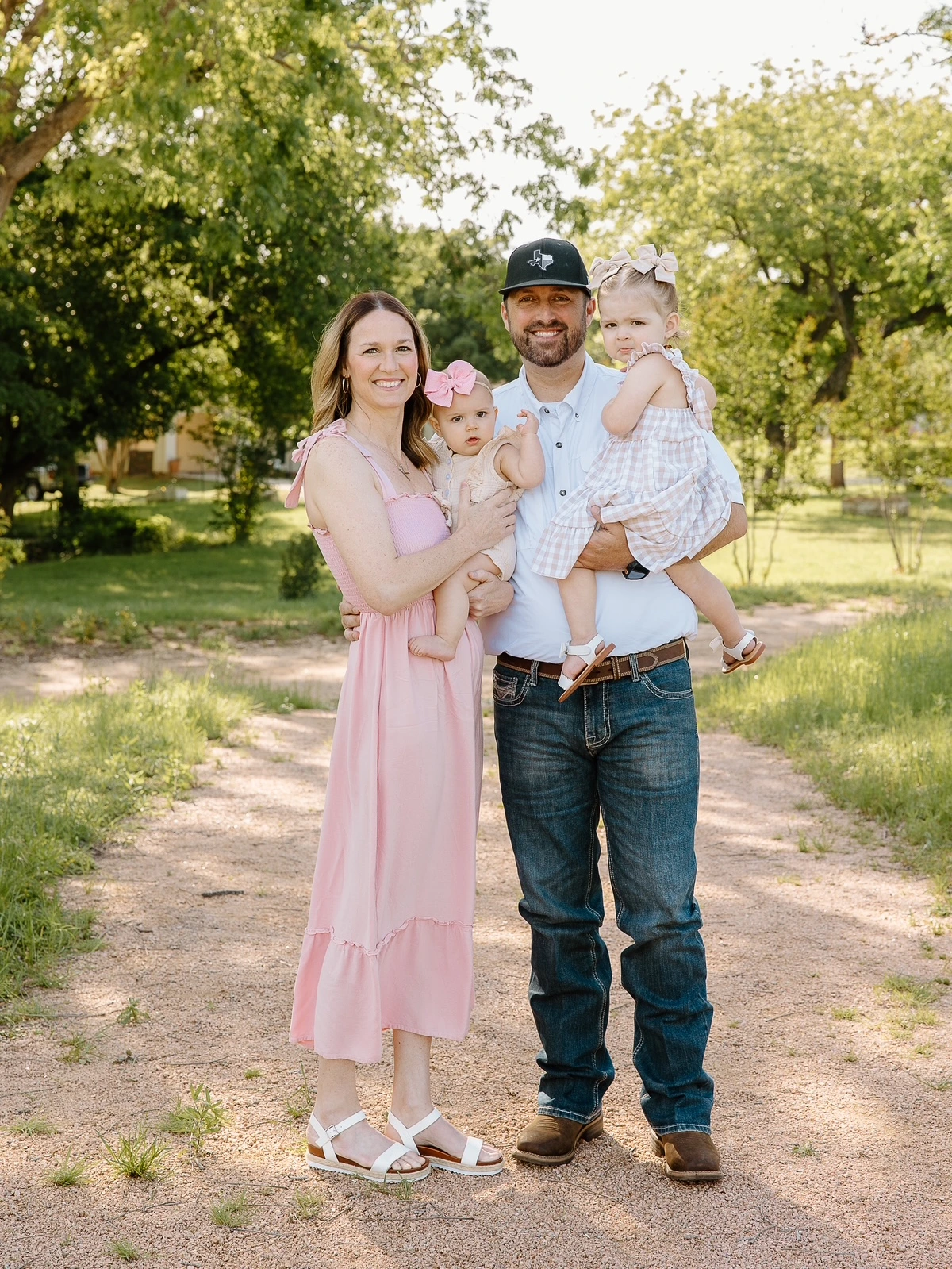 The owners of Waco Trailer Company with their two young daughters