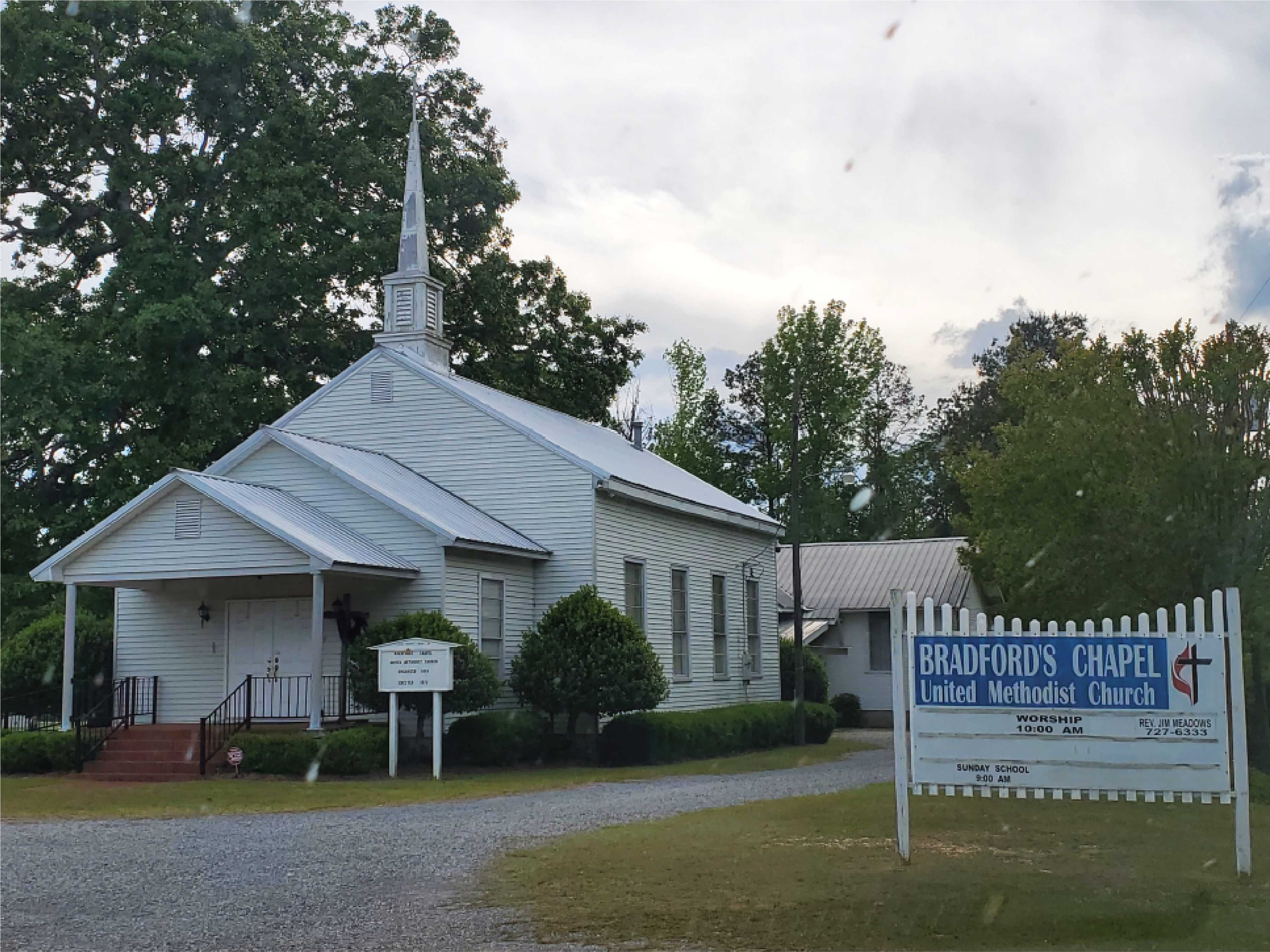 A property in Shorter, Alabama with a well-maintained home and rural surroundings