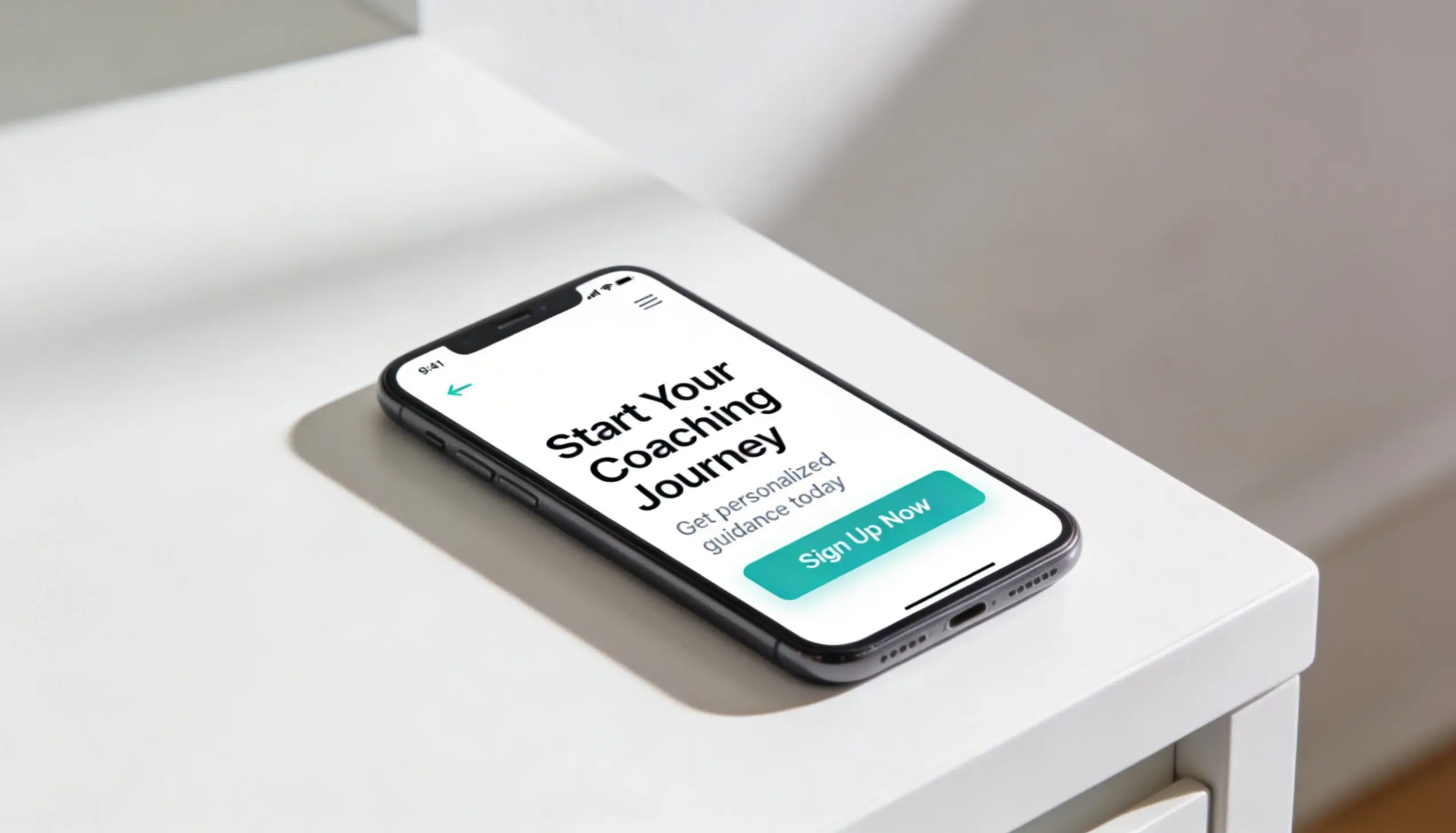 Smartphone showing a coaching opt-in landing page with teal CTA button