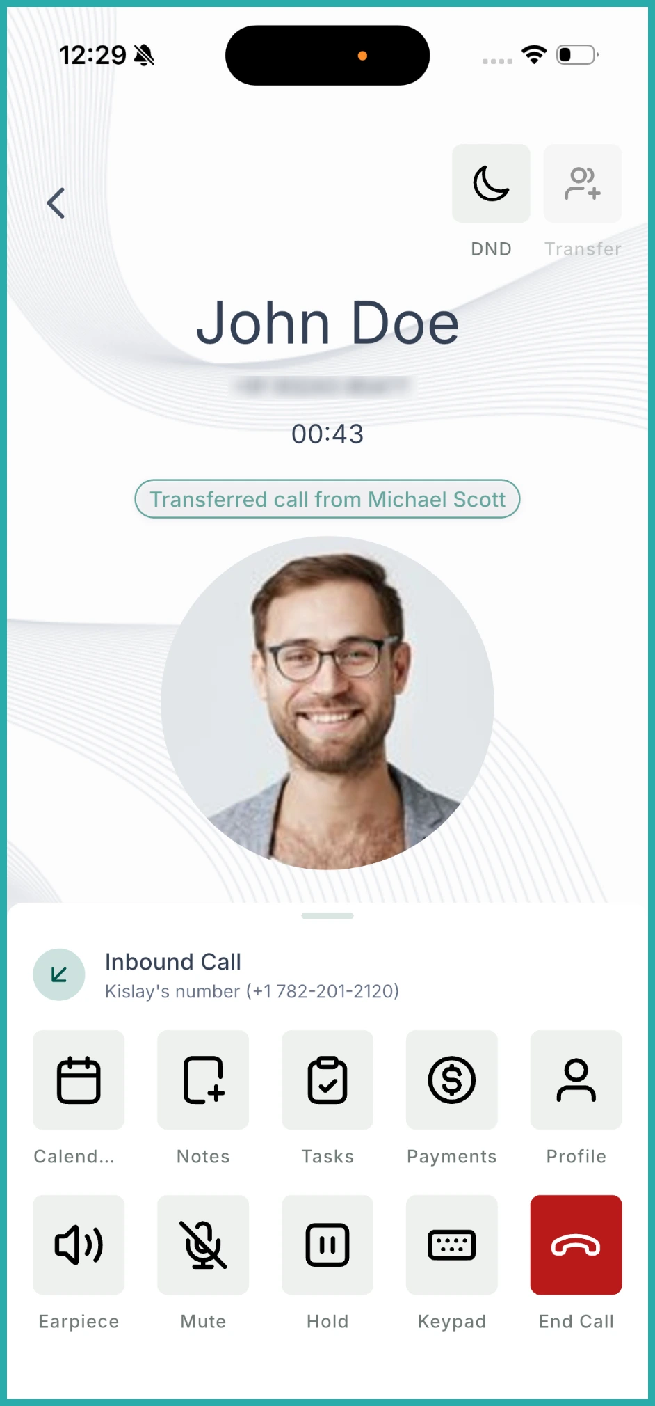 ESC Hub mobile app active call screen showing the transfer call icon and staff member list