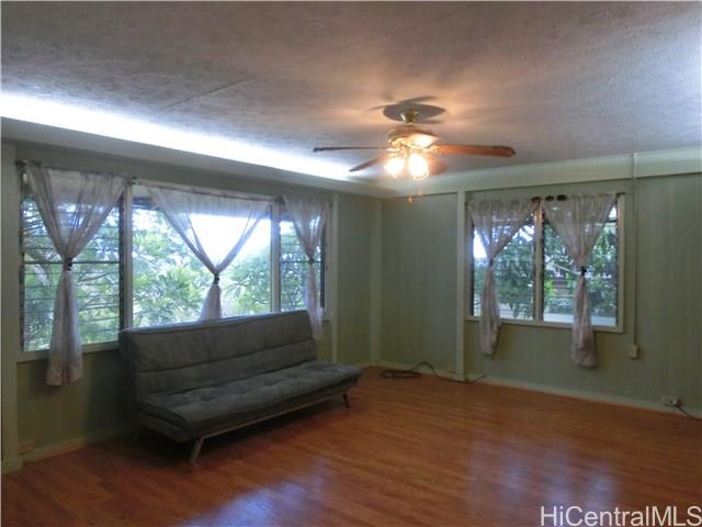 Living area as shown in the previous agent's listing, before The O Team