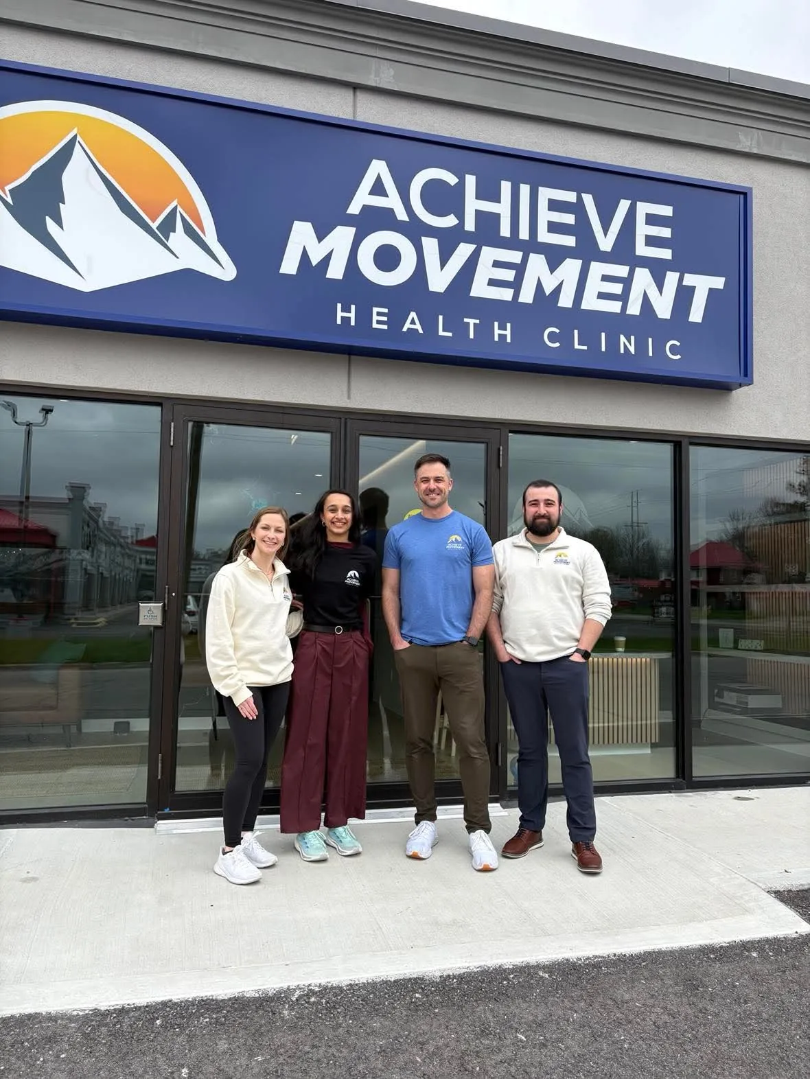 The Achieve Movement Health Clinic team outside the clinic at 63 Queensway W, Simcoe, Ontario